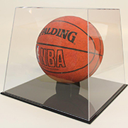 Basketball enclosed in plastic display box